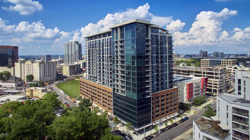 a high rise building in the middle of a city