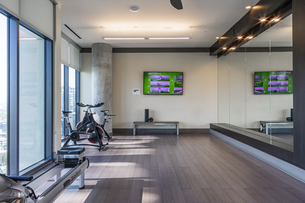 A gym with exercise bikes and treadmills.