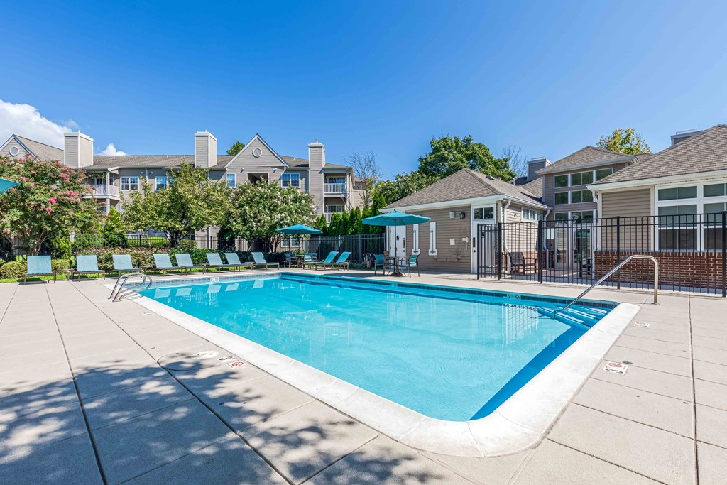 our resort style swimming pool is next to our apartment buildings