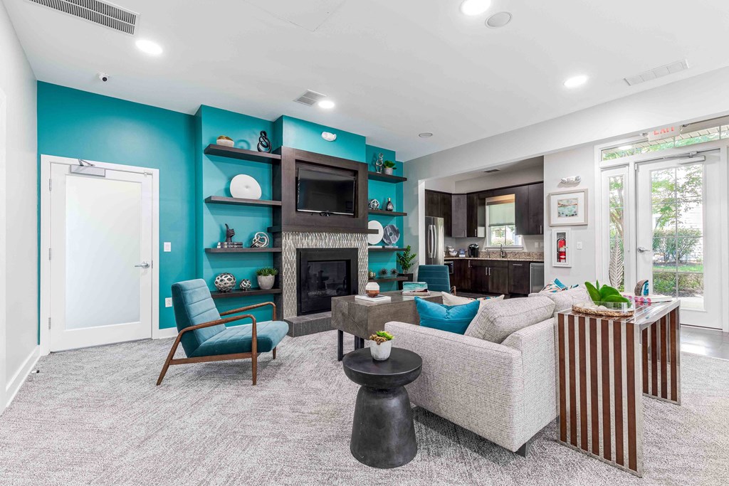leasing ccenter with blue walls and a fireplace
