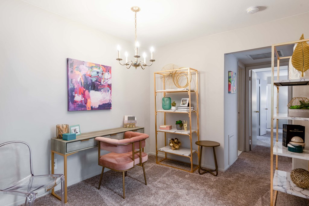 an office with a desk and chairs