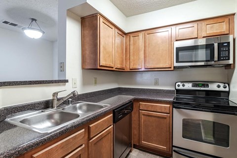 Kitchen with wooden cabinets