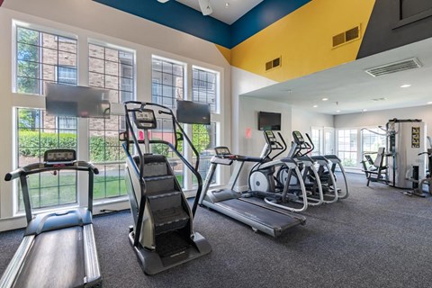a gym with cardio equipment