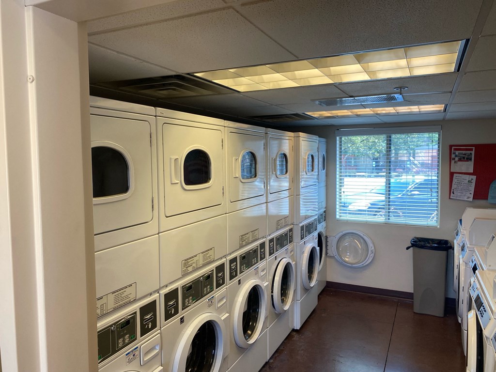 a washer and dryer area in a laundry room