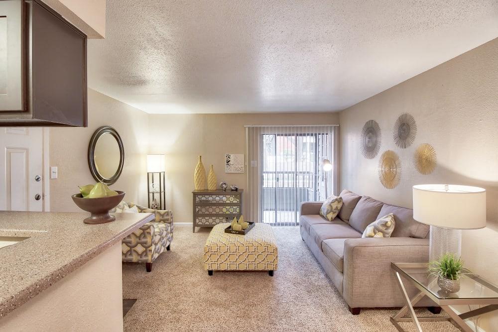 a living room with a couch and a table