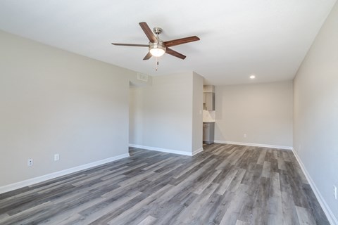 empty living room with wood-style flooring