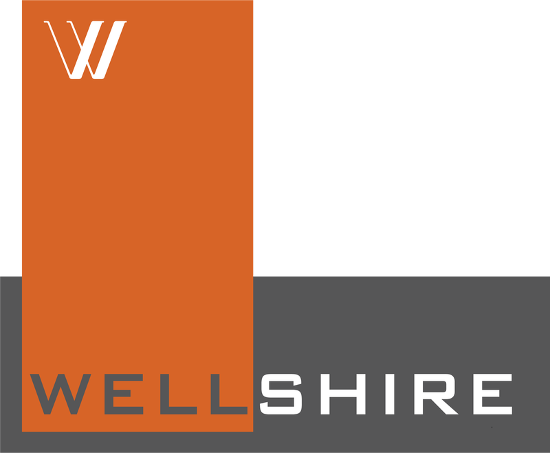 A logo with the word Wellshire in bold letters.