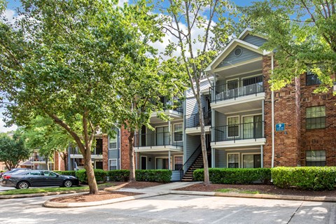 view of apartment building and balconies