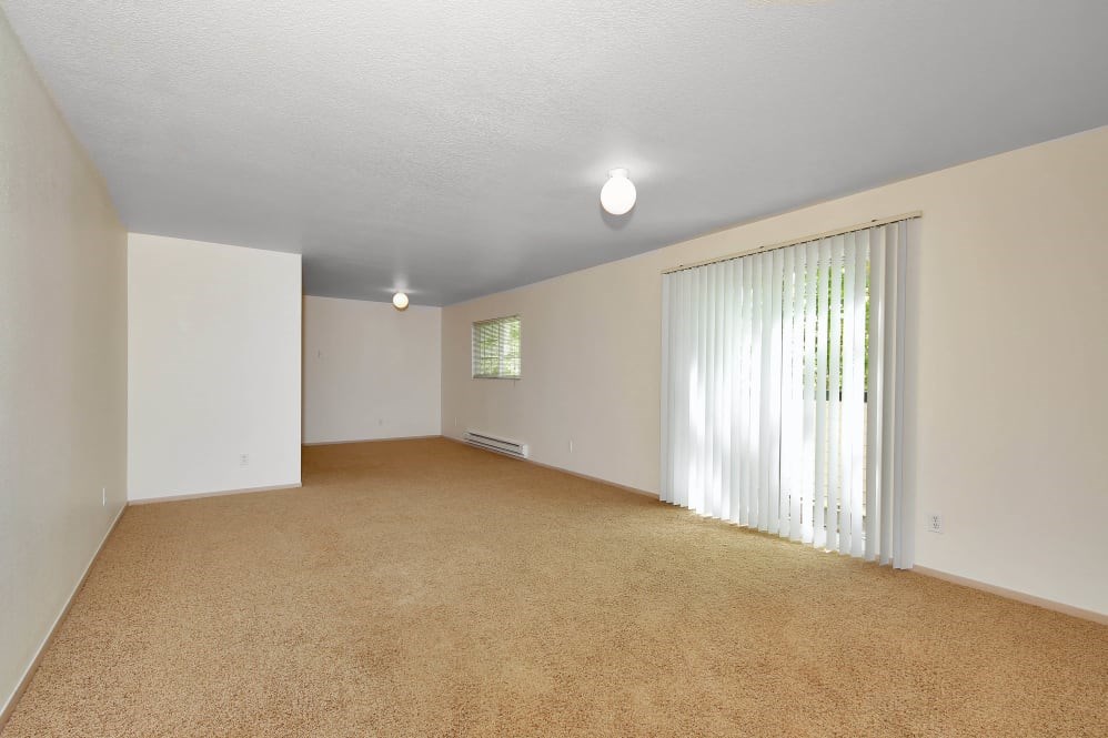 Living Room with carpet and patio doors