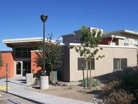 a building with a street lamp in front of it