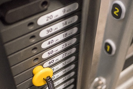 a group of street signs in a display case