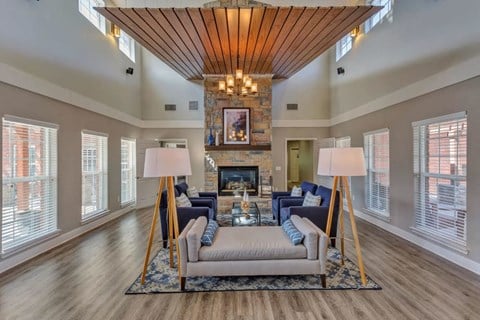 a living room with a couch and a fireplace