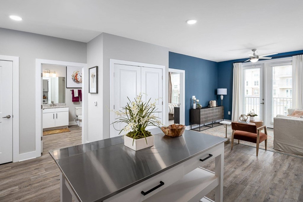 a living room with a table and a couch
