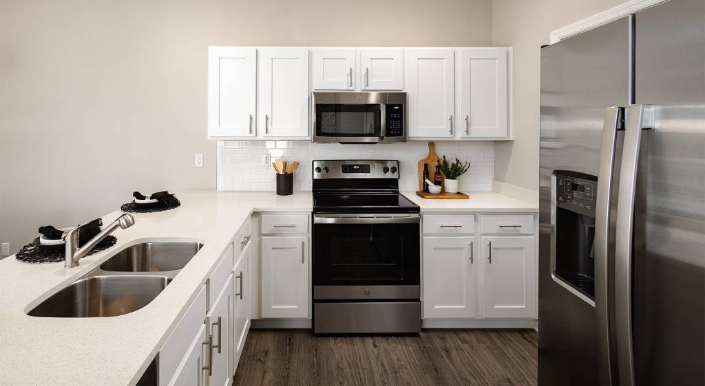 Kitchen with white cabinetry