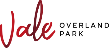 A logo with the words Vale Overland Park.