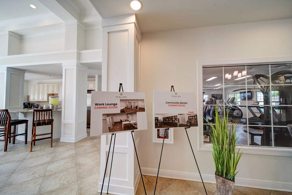 Clubhouse interior with coffee bar and kitchen