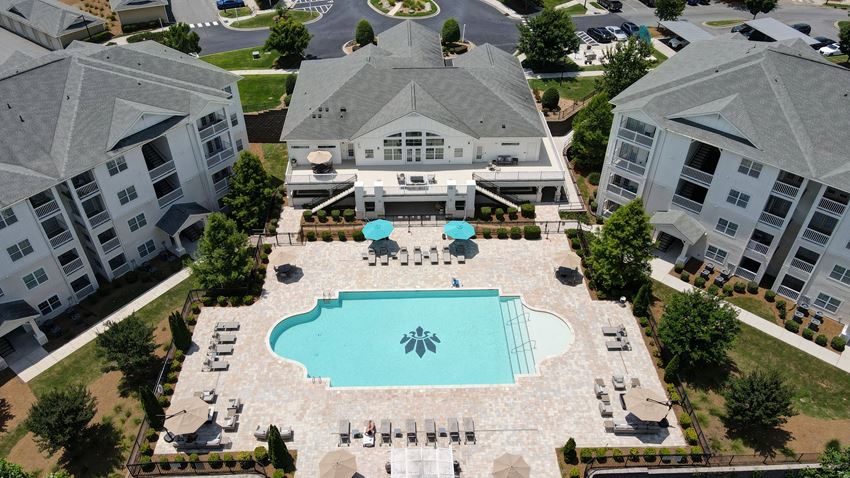aerial view of apartment buildings, leasing office, and pool - Photo Gallery