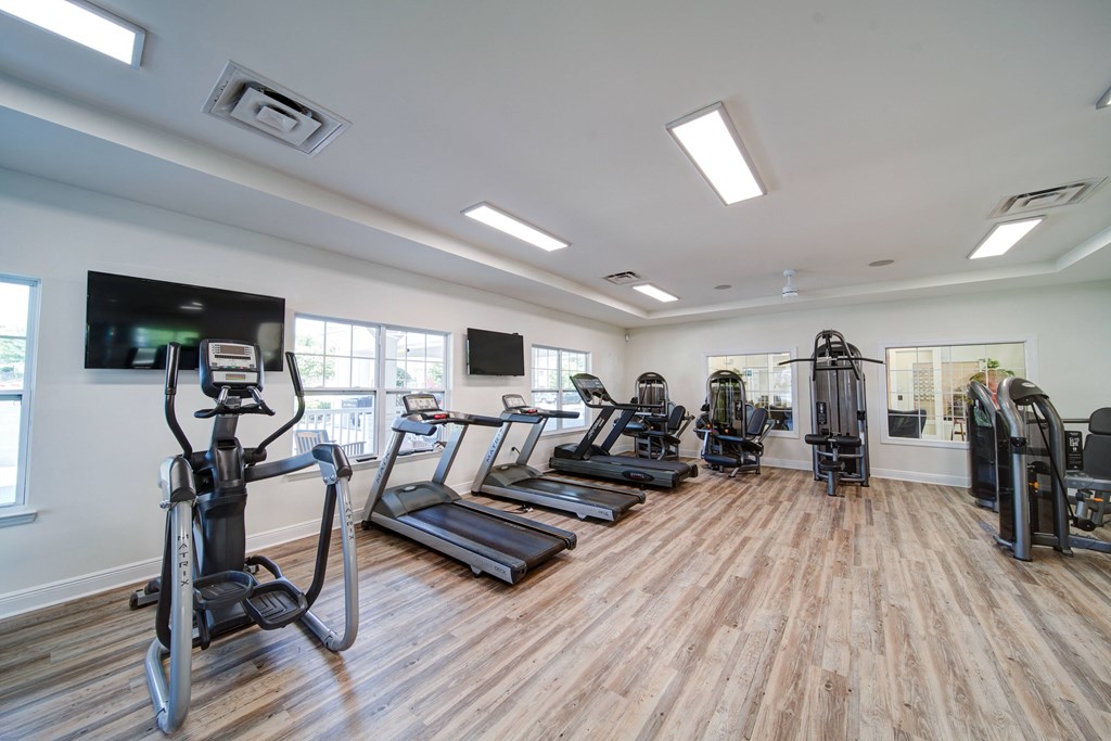 community fitness center with treadmills and workout equipment