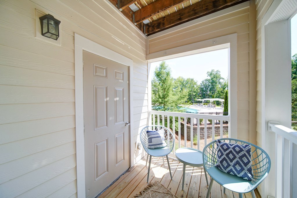 covered balcony with storage closet