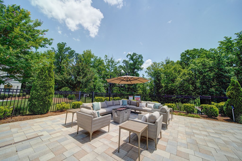 outdoor lounge area with couches and chairs