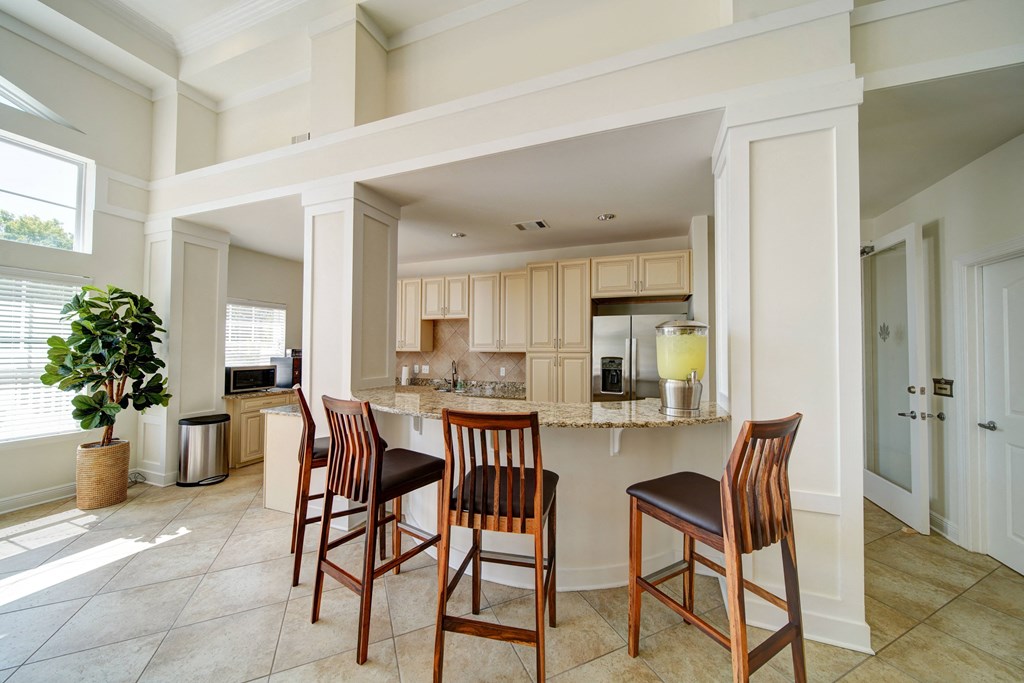 Clubhouse interior with coffee bar and kitchen