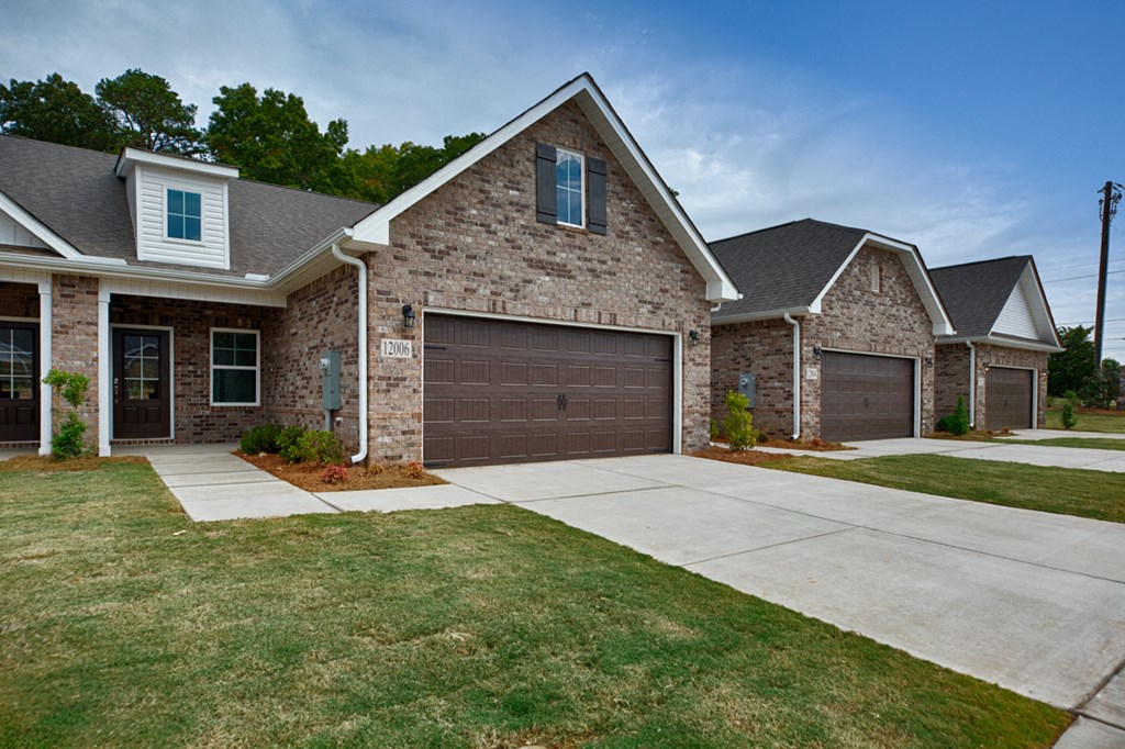 a house with a brown garage door