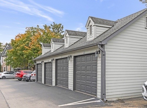 A two-car garage is attached to a house.