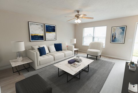 a living room with a white couch and a coffee table