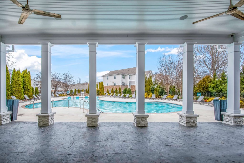 the swimming pool at the estates apartments
