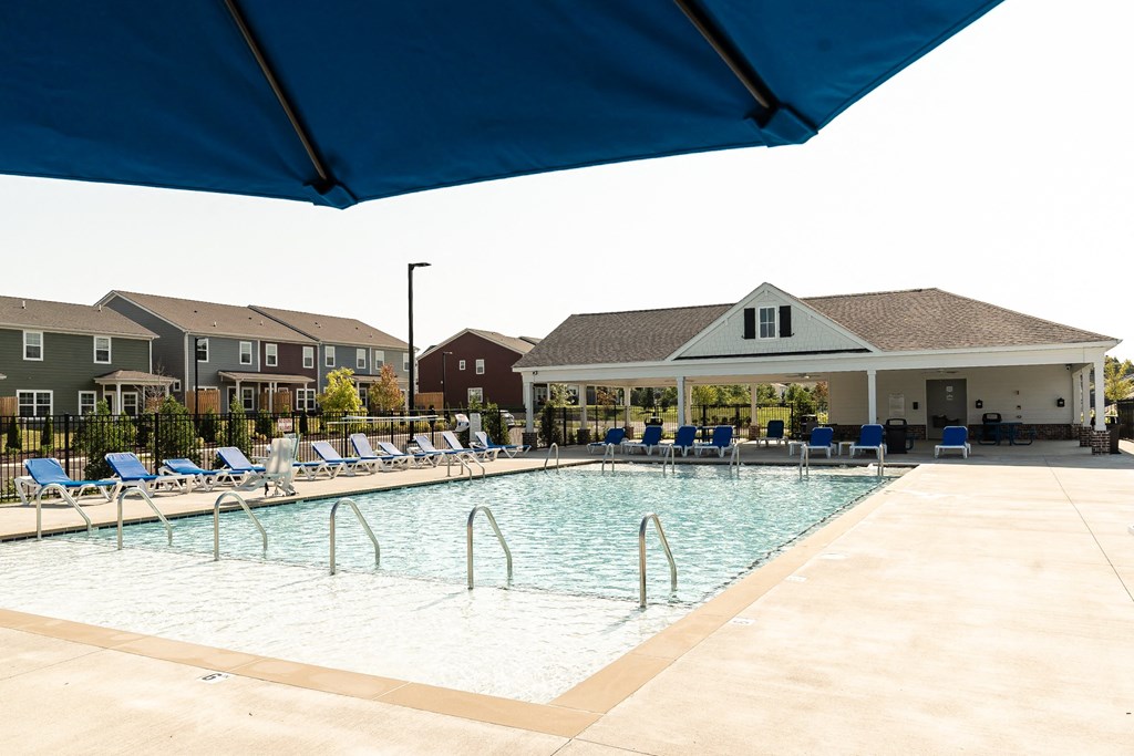 a large pool with a fence around it a large pool with a fence around it