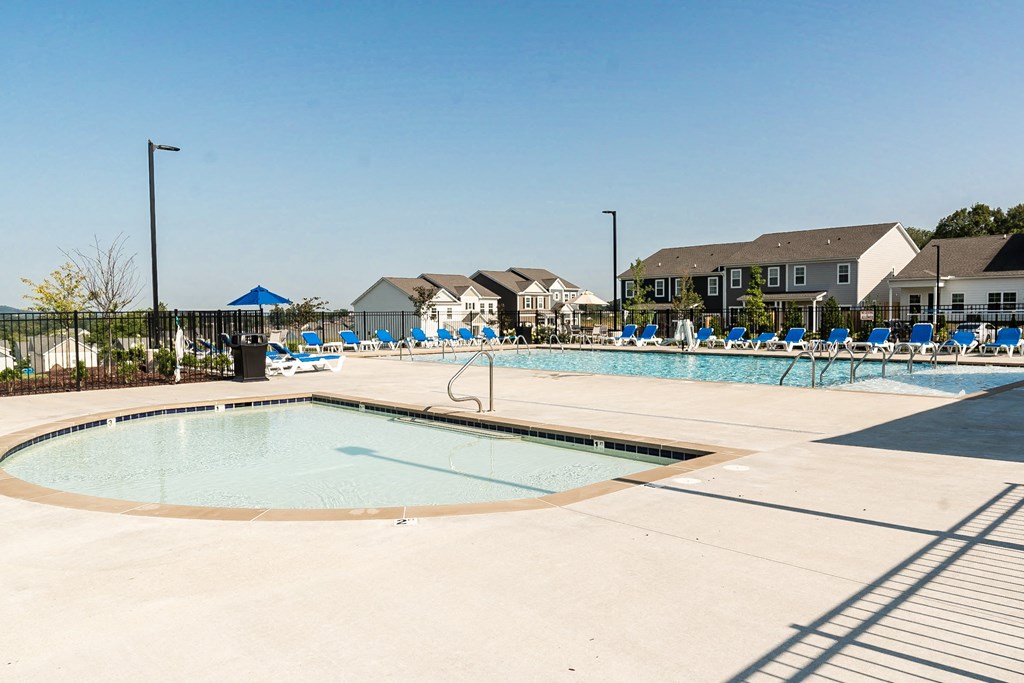 a large pool with a fence around it
