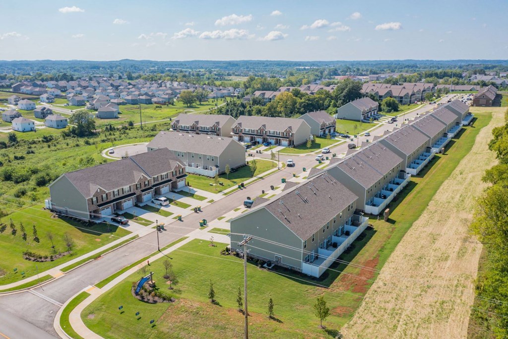 a group of houses in a suburb