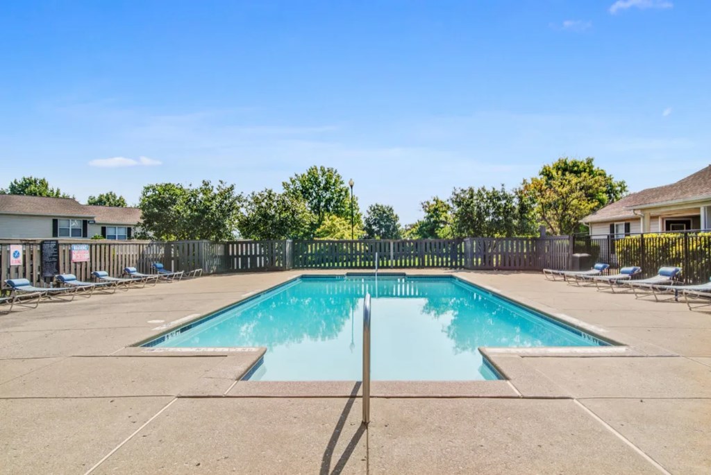 Sparkling community swimming pool available to residents at Parklight Townhomes