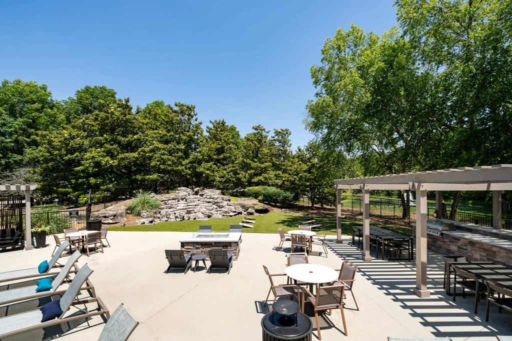 A sunny day at the outdoor seating area of a restaurant.