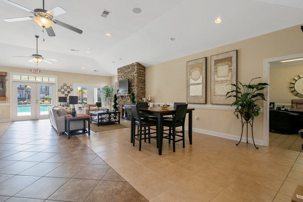 the living room and dining room are spacious and open to the pool