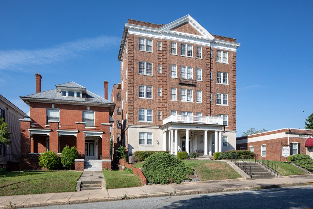 a large brick building on a city street