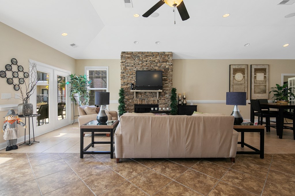 a living room with a couch and a television