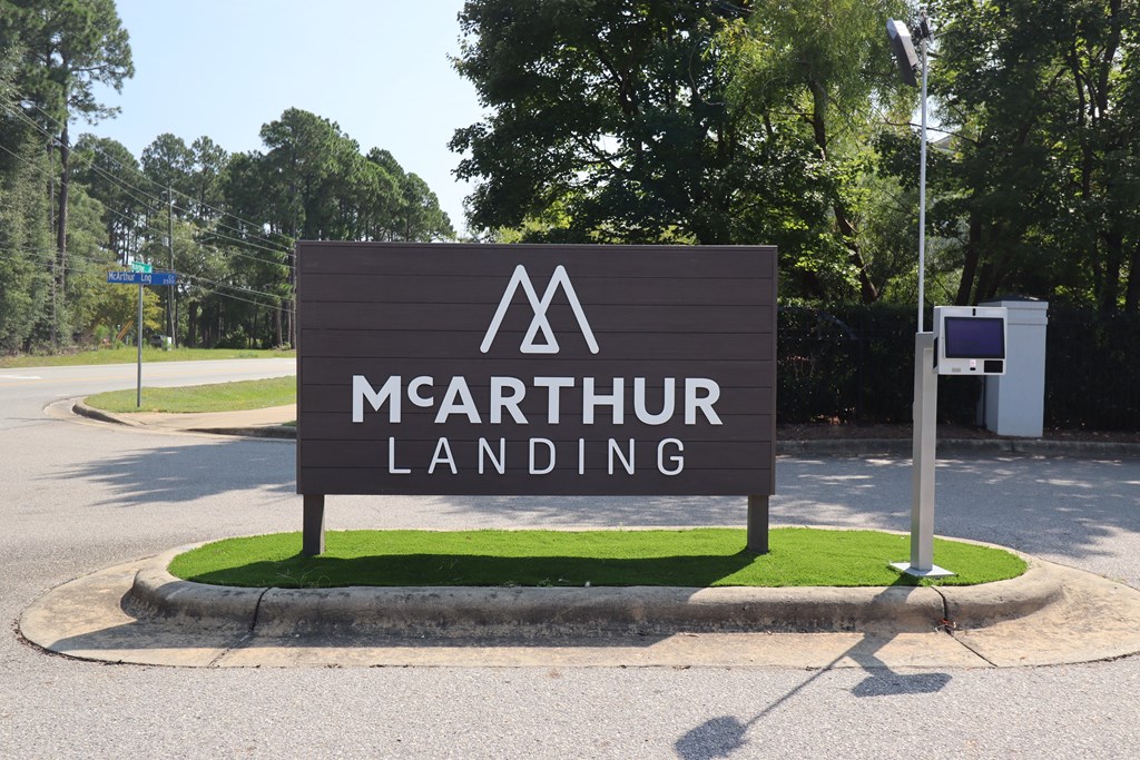 the sign at the entrance to the parking lot of the