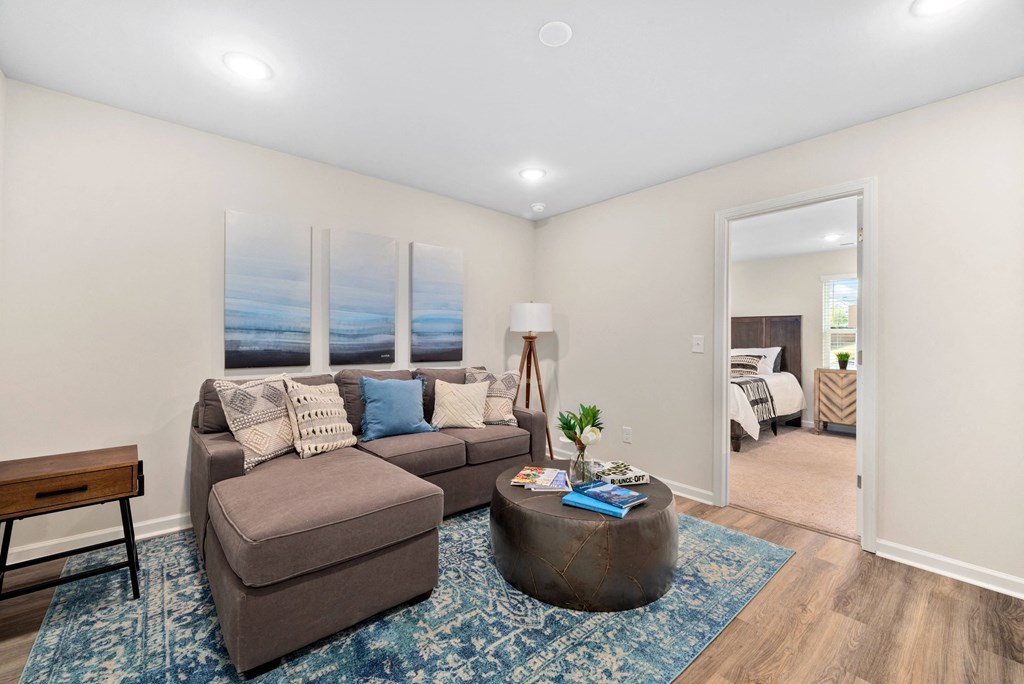 a living room with a couch and a coffee table