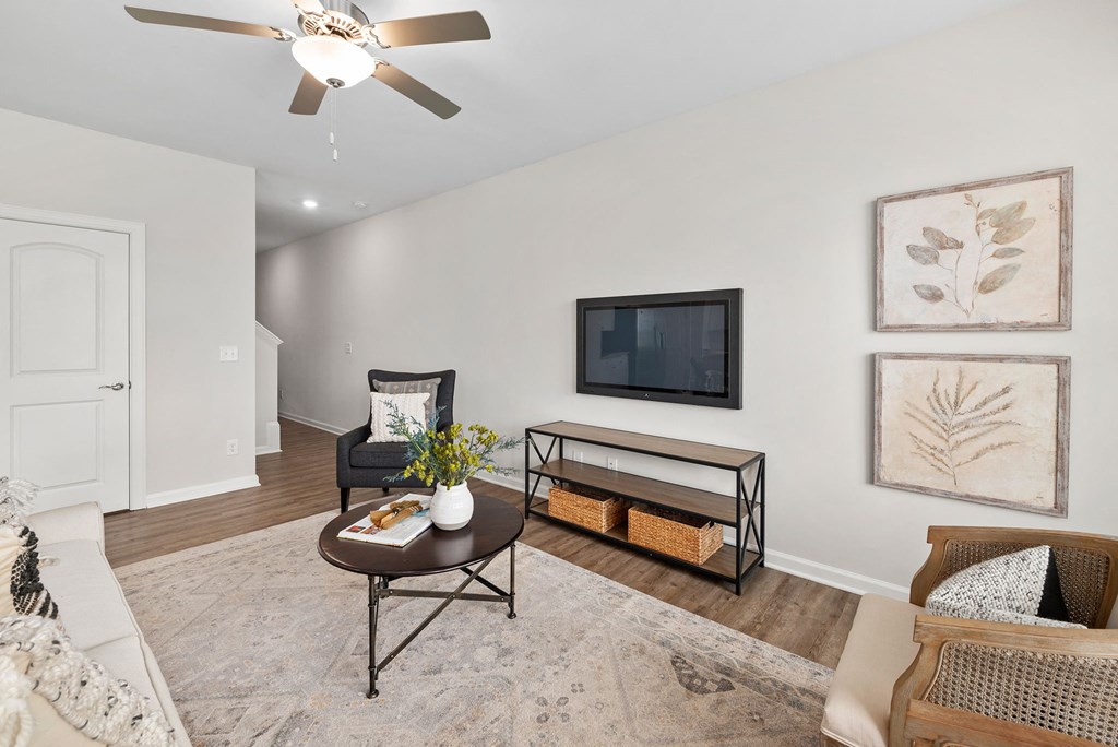 a living room with a couch and a tv