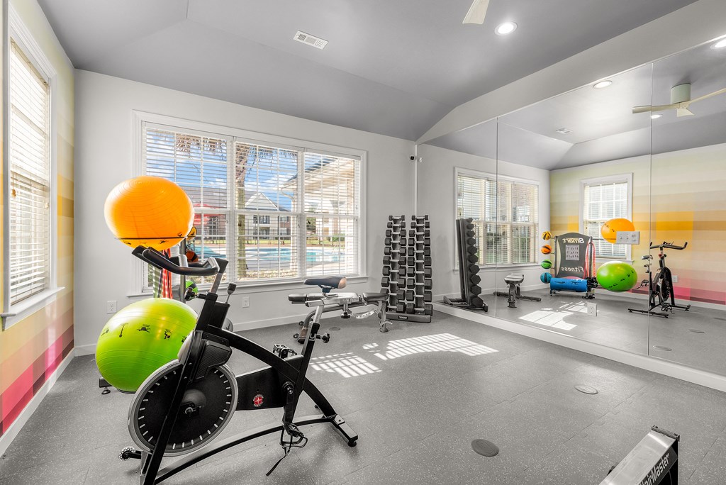 the gym at the flats at big tex apartments