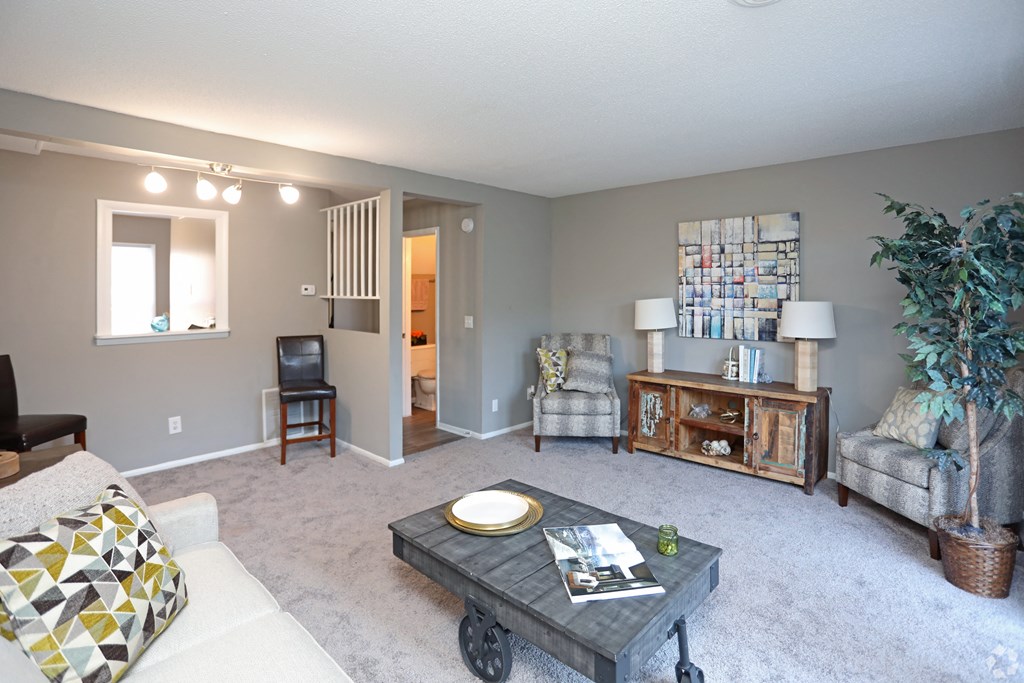 a living room with a couch and a coffee table