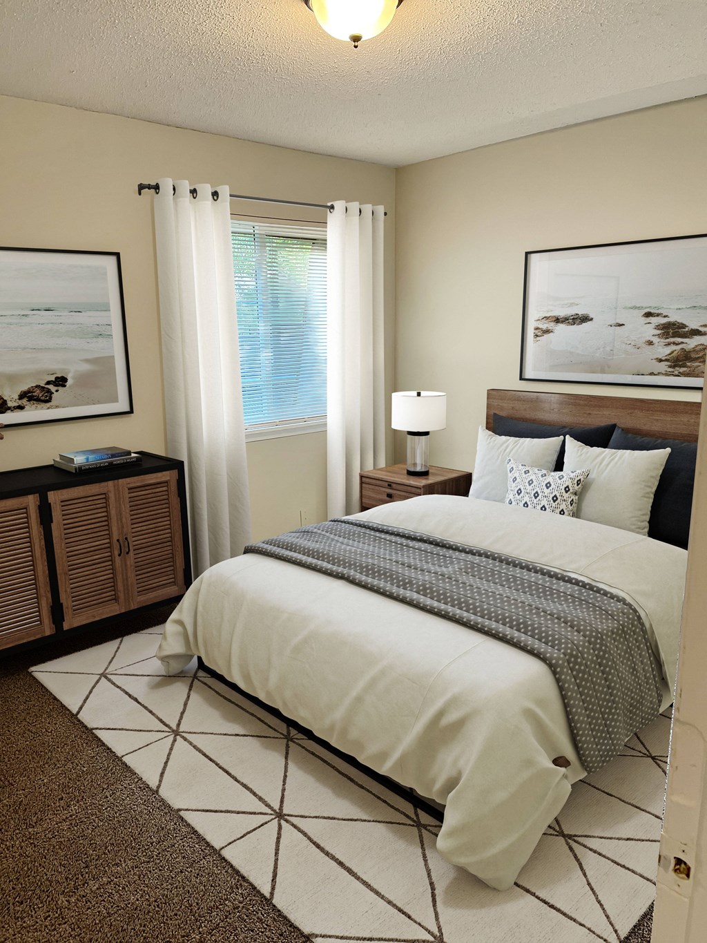 a bedroom with a bed and two night stands