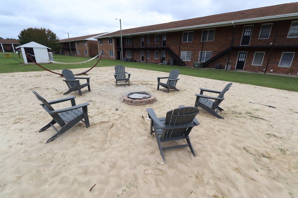 our fire pit on the sand in front of our building