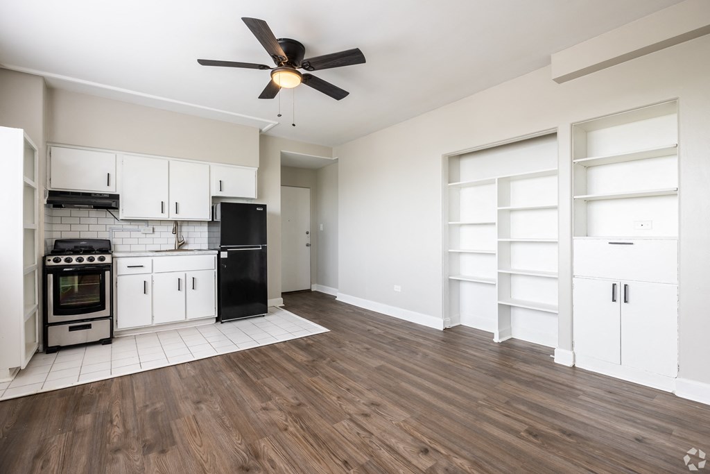 a kitchen and living room in a house