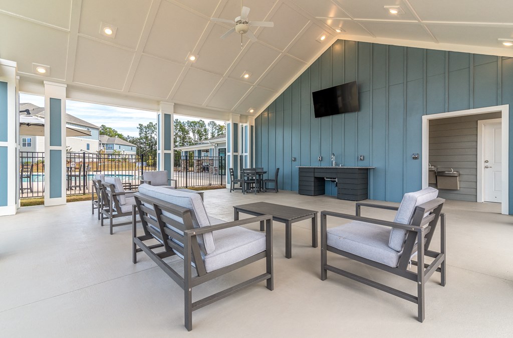 the gathering room has a fireplace and seating areas