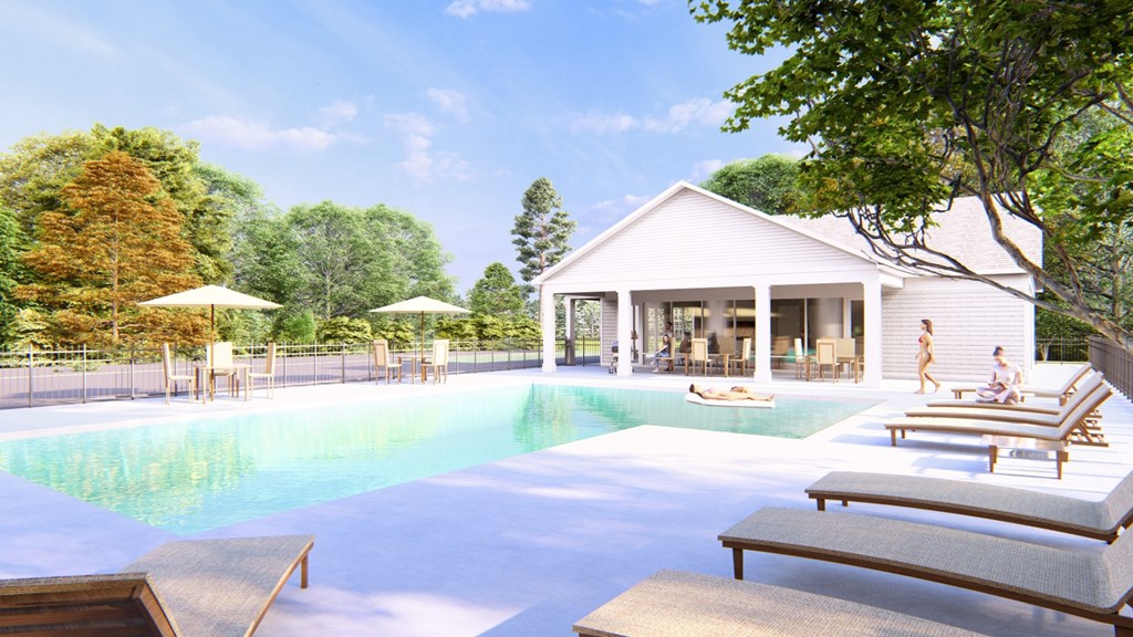 A poolside scene with a white house and people relaxing by the pool.