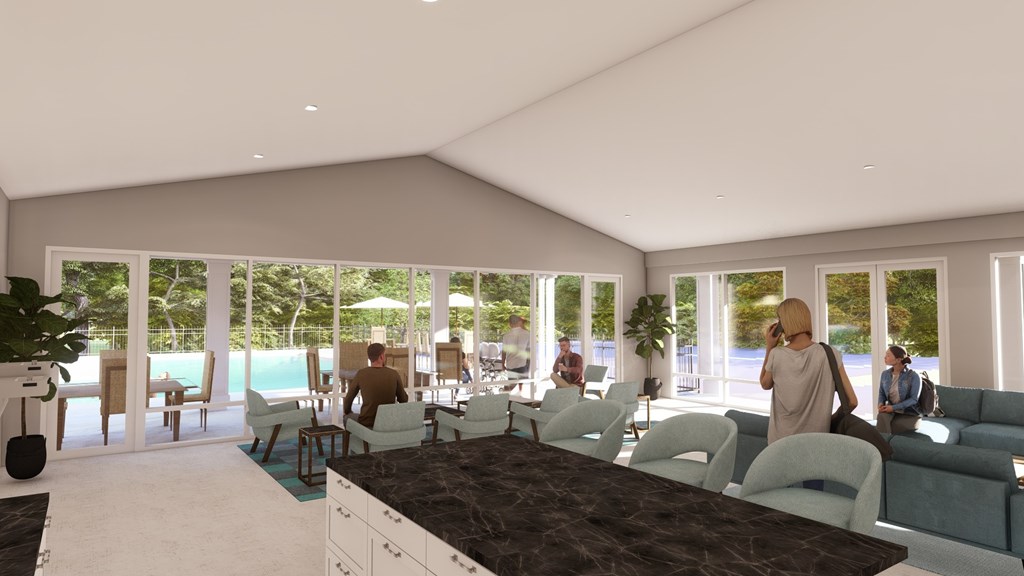 A group of people are sitting and standing in a room with a pool outside.