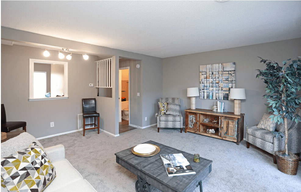 a living room with a couch and a coffee table