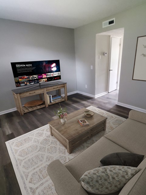 a living room with a couch and a coffee table